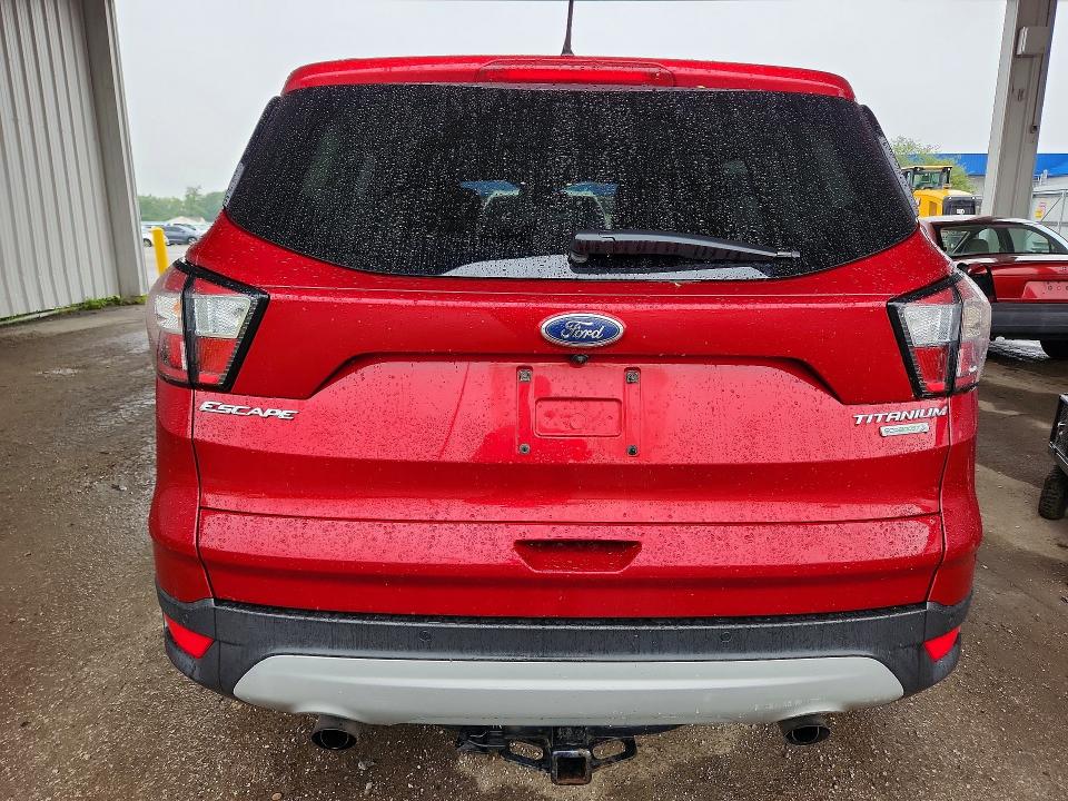 Photo 6 from auction – 2018 FORD ESCAPE with VIN 1FMCU0J96JUA07183