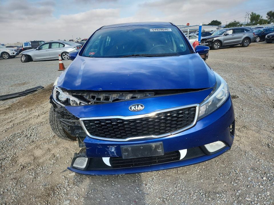 Photo 5 from auction – 2017 KIA FORTE with VIN 3KPFL4A79HE062388