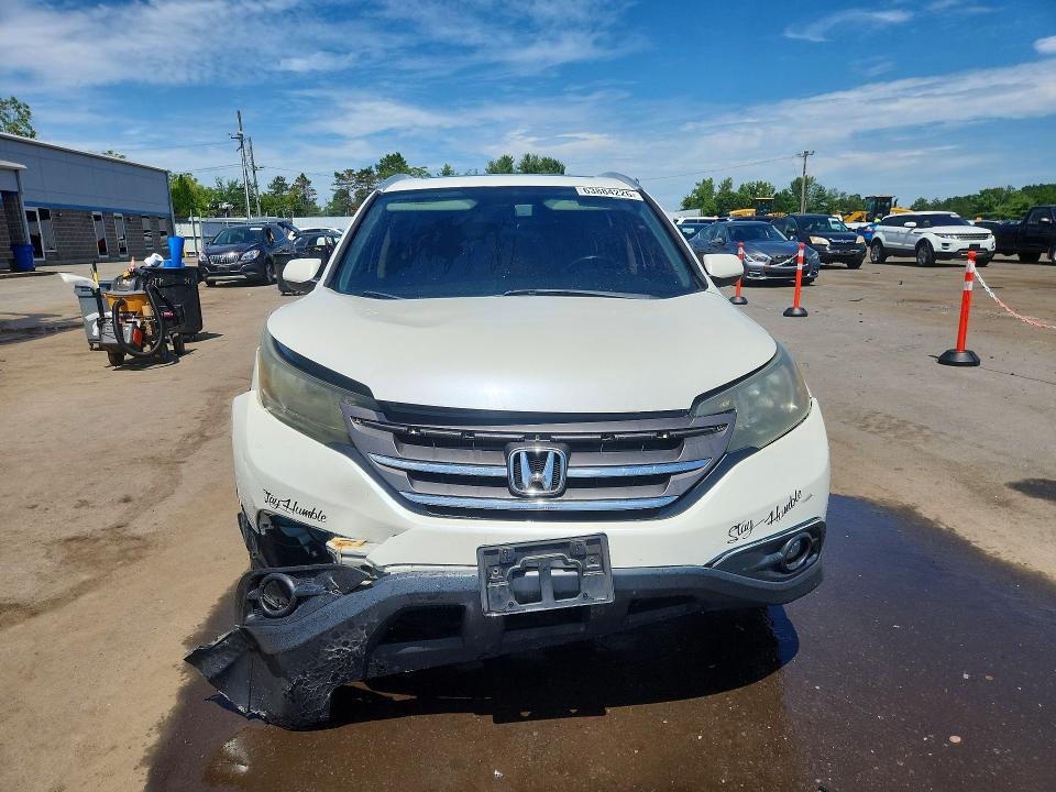 Photo 5 from auction – 2014 HONDA CR-V with VIN 5J6RM4H77EL012571