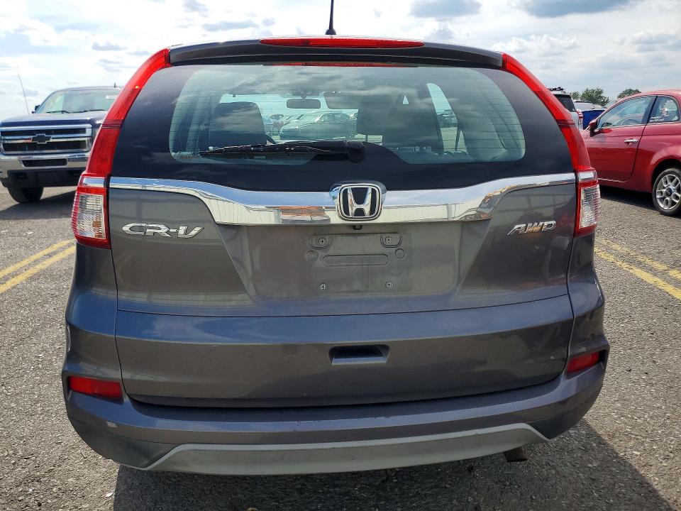 Photo 6 from auction – 2016 HONDA CR-V with VIN 5J6RM4H39GL000695