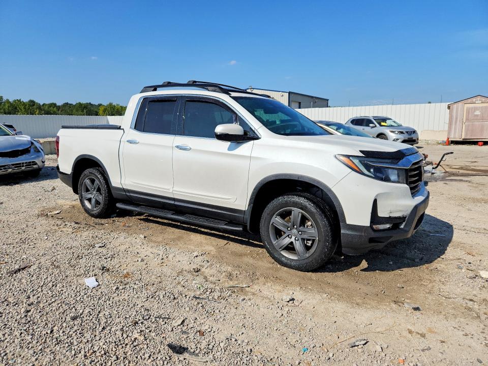 Photo 4 from auction – 2021 HONDA RIDGELINE with VIN 5FPYK3F73MB019658