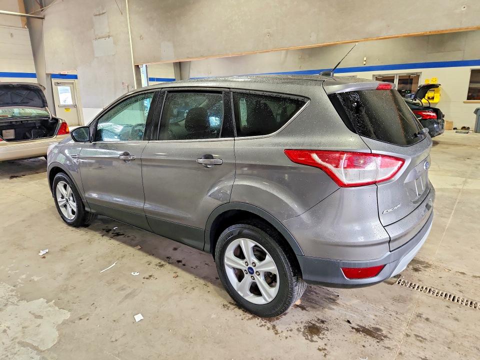 Photo 2 from auction – 2014 FORD ESCAPE with VIN 1FMCU9GX7EUB23671