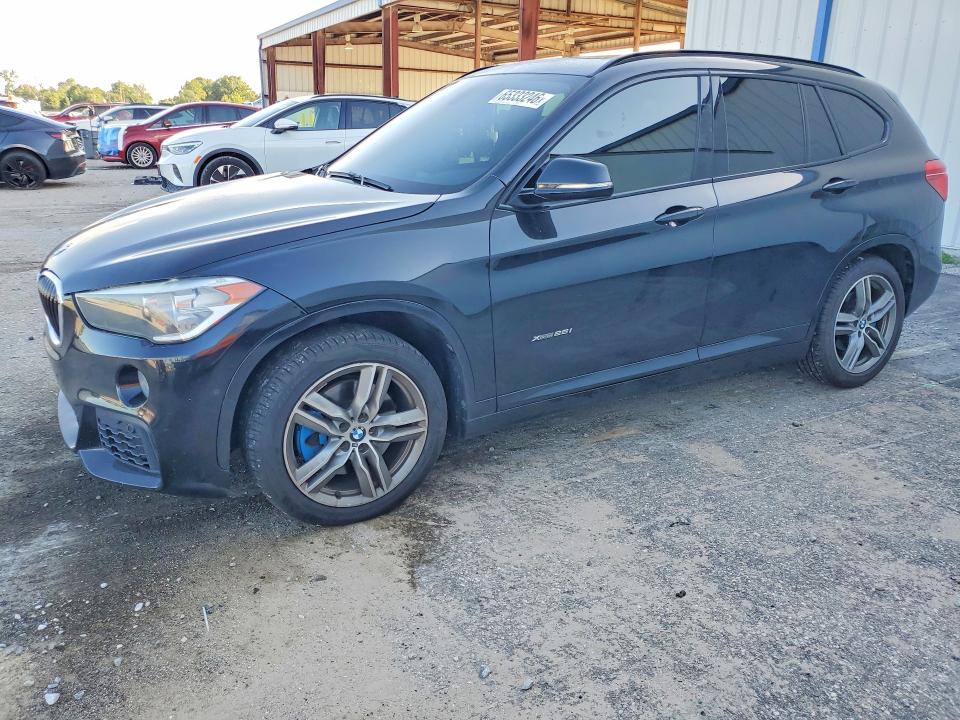 BMW X1 2016 with VIN WBXHT3C37G5E52841 - Photo from auction