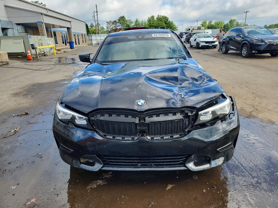 Photo 5 from auction – 2019 BMW 330I with VIN WBA5R1C54KAK06392