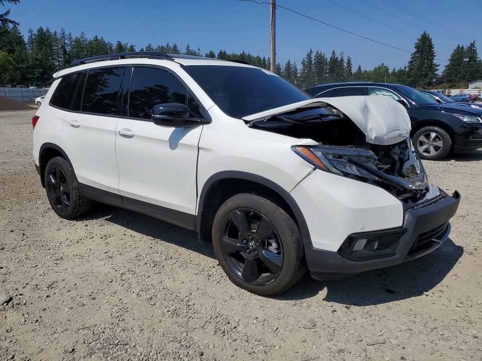 Photo 4 from auction – 2021 HONDA PASSPORT with VIN 5FNYF8H00MB013794