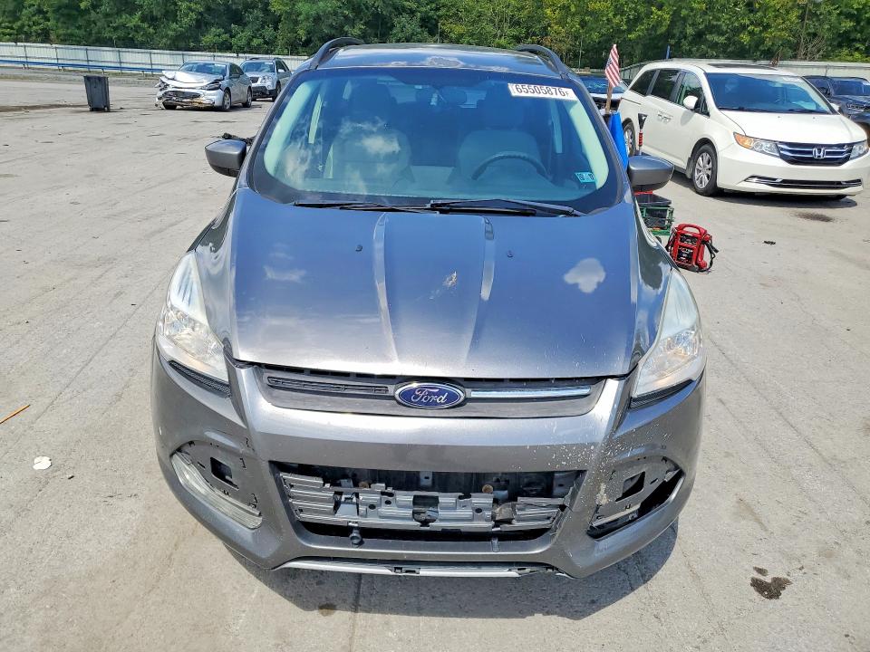 Photo 5 from auction – 2014 FORD ESCAPE with VIN 1FMCU9G98EUC02364