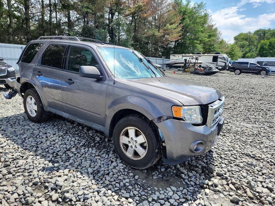 Foto 4 de la subasta – 2011 FORD ESCAPE con VIN 1FMCU0D73BKC39649