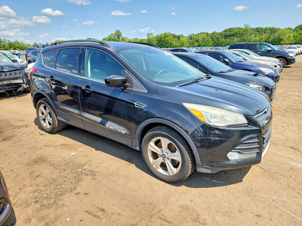 Photo 4 from auction – 2014 FORD ESCAPE with VIN 1FMCU9G95EUB11049