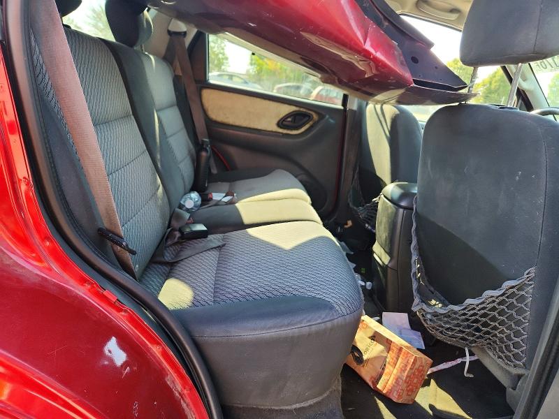 Photo 11 from auction – 2003 FORD ESCAPE with VIN 1FMCU93173KE00877