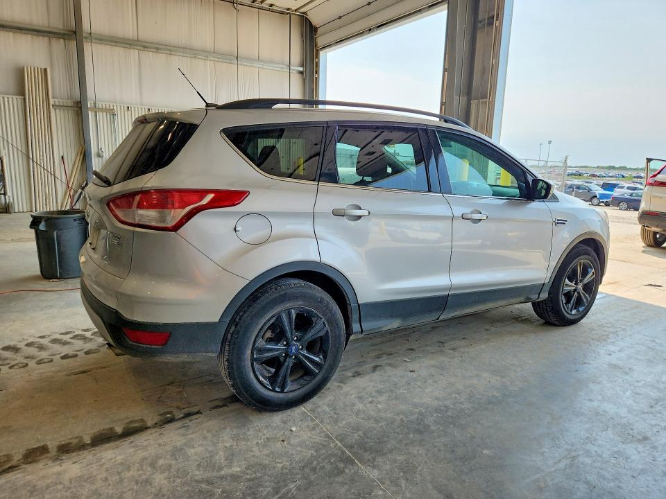 Photo 3 from auction – 2016 FORD ESCAPE with VIN 1FMCU9GX7GUA56296