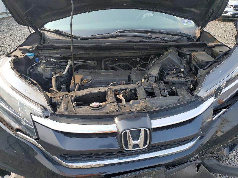 Снимка 12 от търг – 2016 HONDA CR-V с VIN 2HKRM4H40GH618345