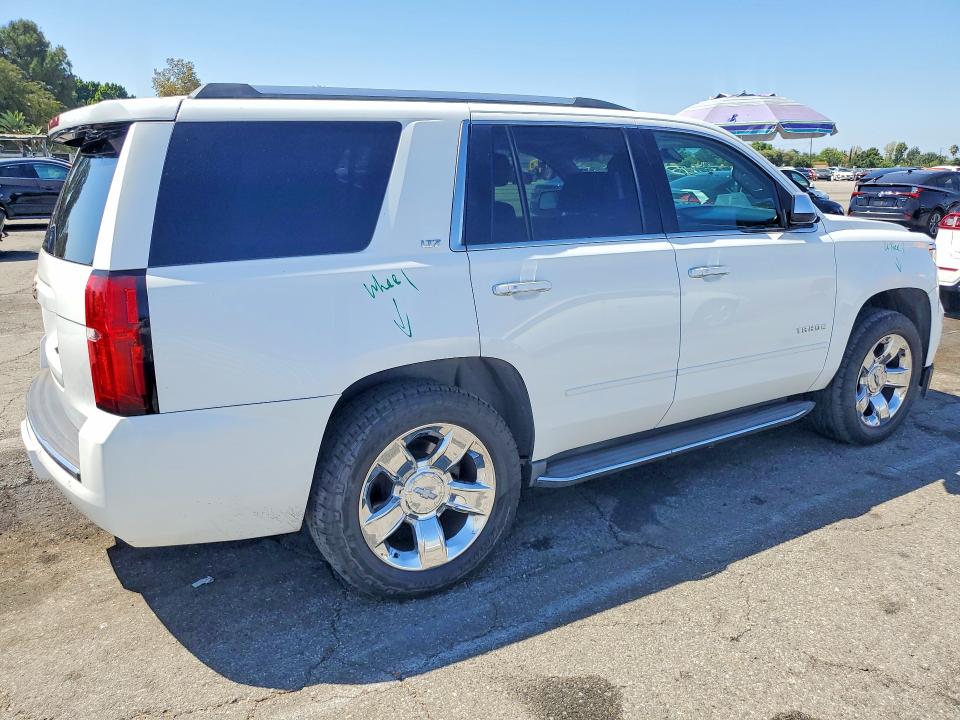 Photo 3 from auction – 2015 CHEVROLET TAHOE with VIN 1GNSCCKC8FR185564