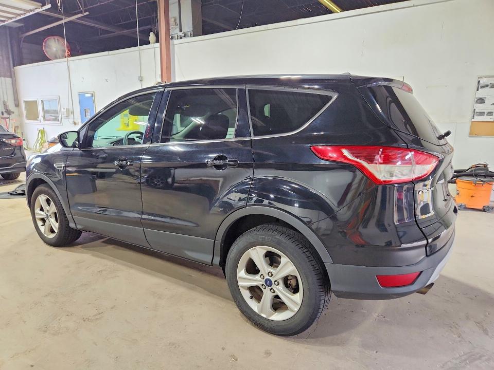 Photo 2 from auction – 2016 FORD ESCAPE with VIN 1FMCU9G99GUA77457
