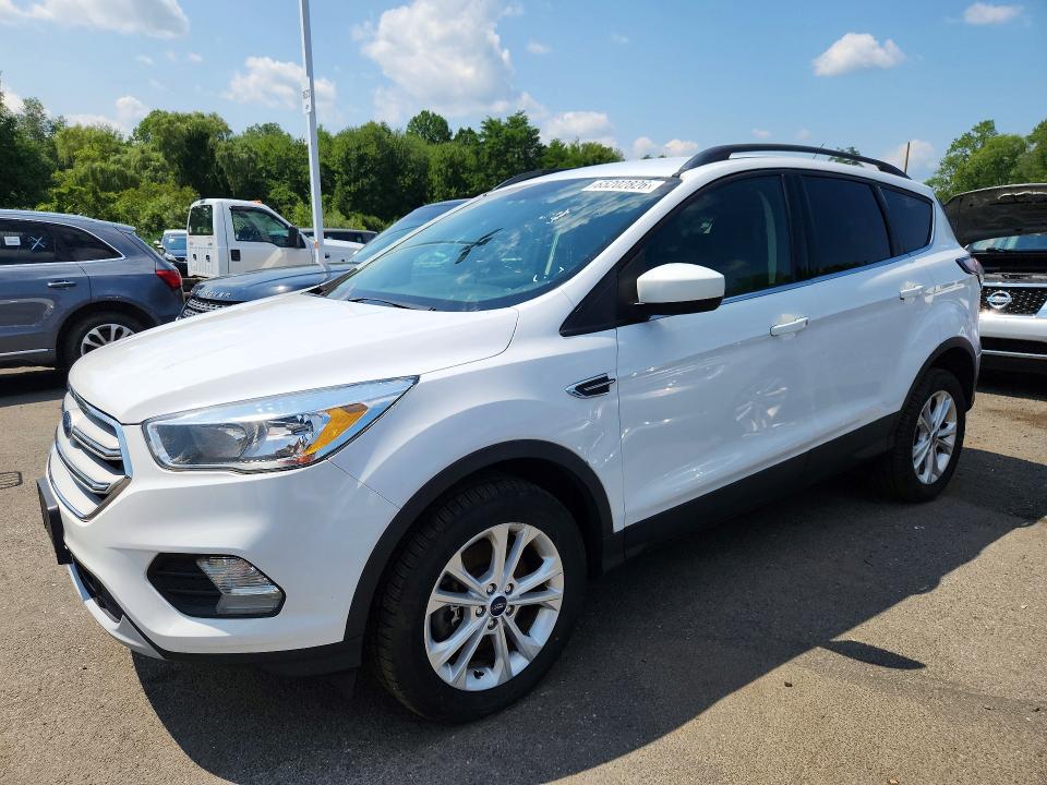 FORD ESCAPE 2018 with VIN 1FMCU9GD7JUD06312 - Photo from auction