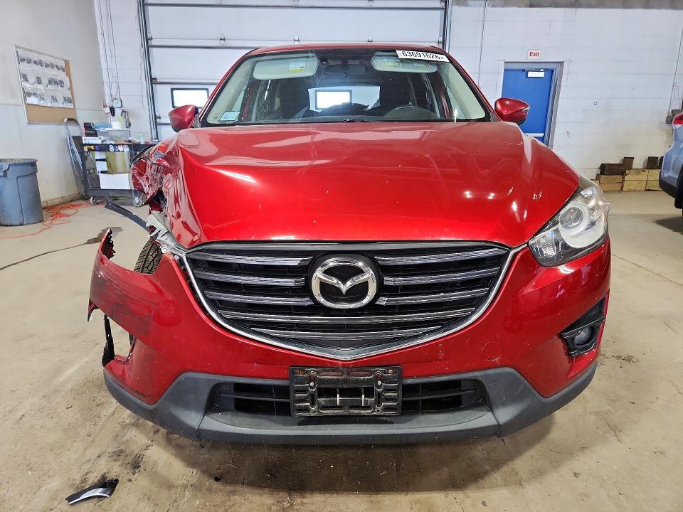 Photo 5 from auction – 2016 MAZDA CX-5 with VIN JM3KE4CY3G0921648