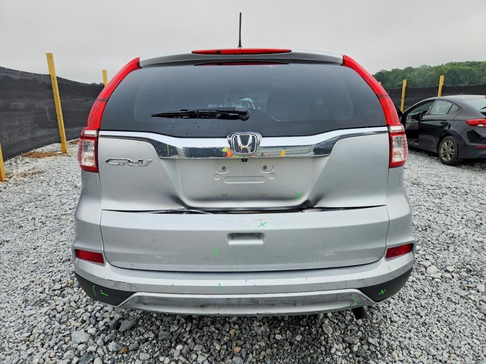 Photo 6 from auction – 2015 HONDA CR-V with VIN 2HKRM3H57FH503579