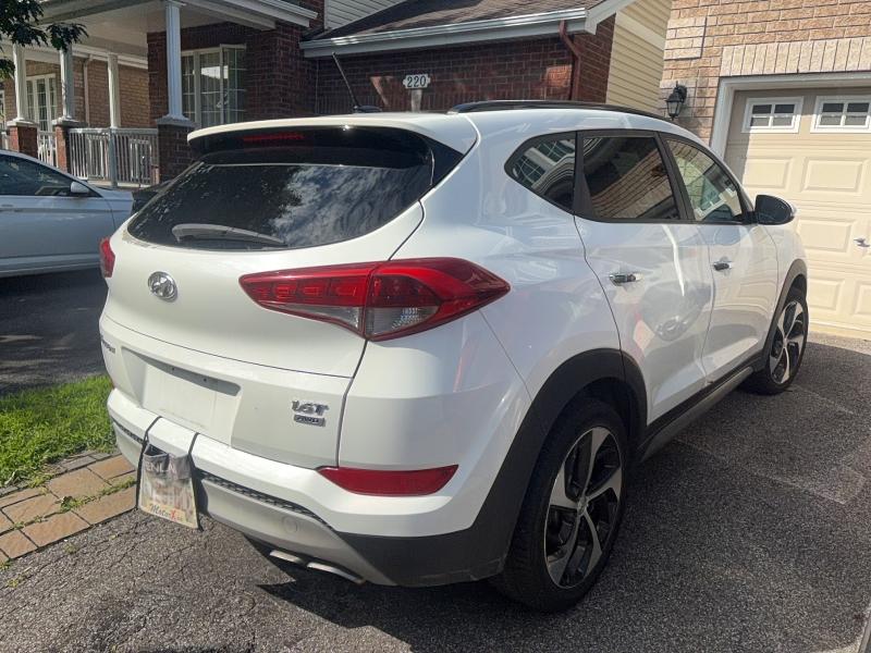 Photo 3 from auction – 2017 HYUNDAI TUCSON with VIN KM8J3CA21HU264373