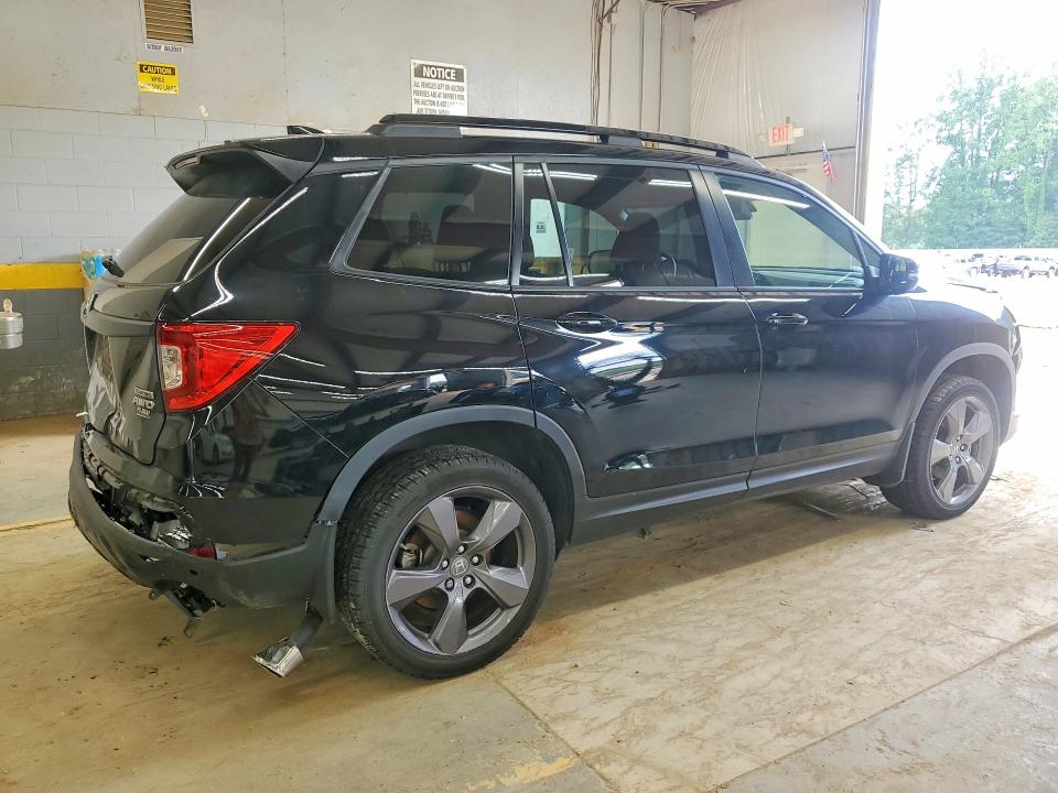 Photo 3 from auction – 2021 HONDA PASSPORT with VIN 5FNYF8H91MB017383