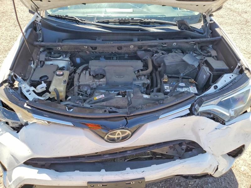 Photo 11 from auction – 2018 TOYOTA RAV4 with VIN JTMBFREV4JJ740470