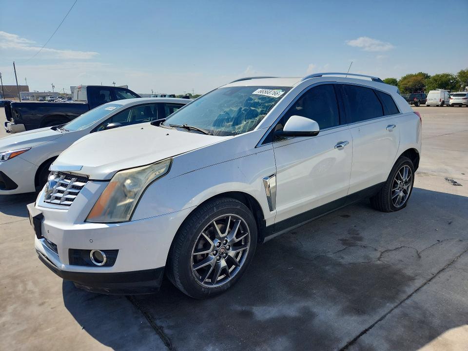 CADILLAC SRX 2015 с VIN 3GYFNCE33FS587404 - Снимка от търг