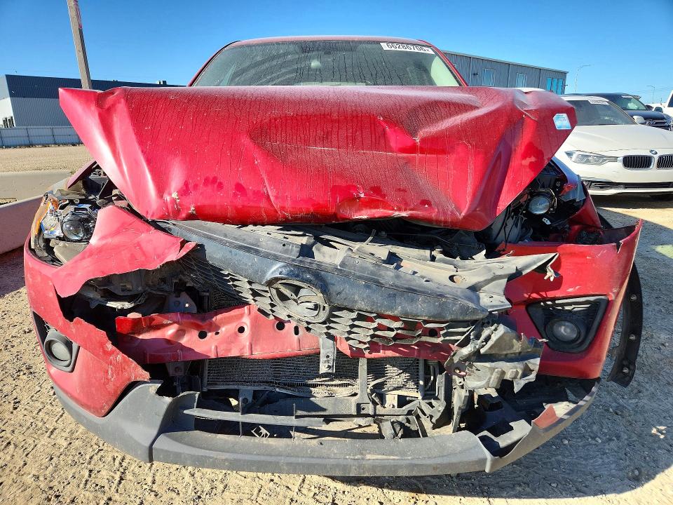 Photo 5 from auction – 2014 MAZDA CX-5 with VIN JM3KE2CYXE0317497