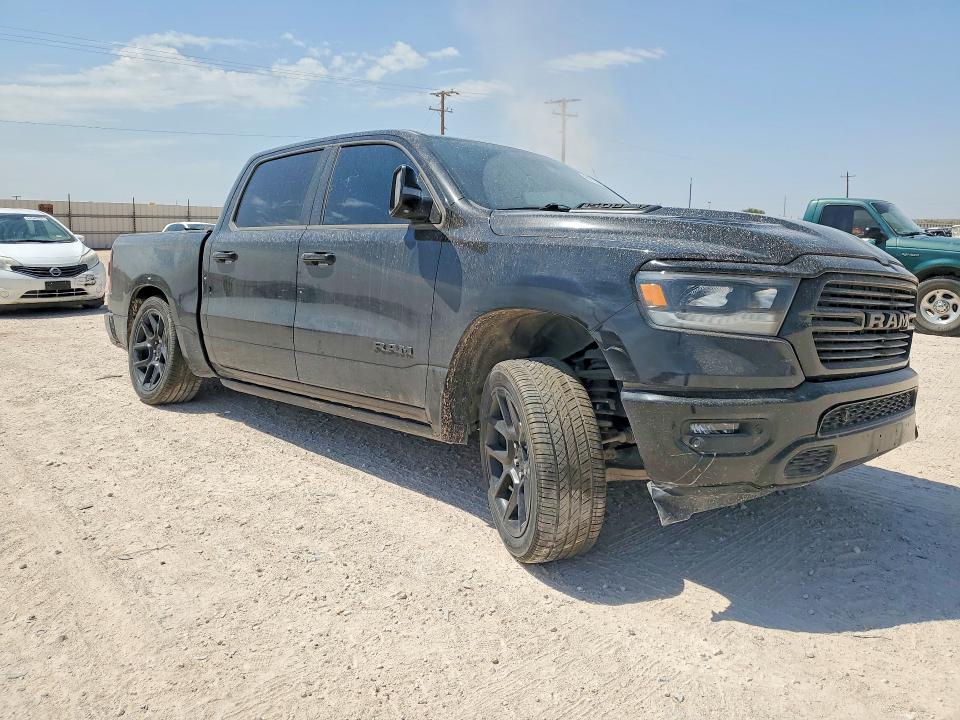 Photo 4 from auction – 2024 RAM 1500 with VIN 1C6SRFJT8RN103068