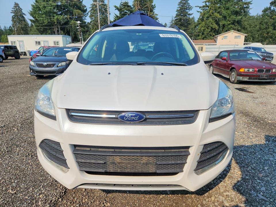 Photo 5 from auction – 2016 FORD ESCAPE with VIN 1FMCU9GX7GUA68772