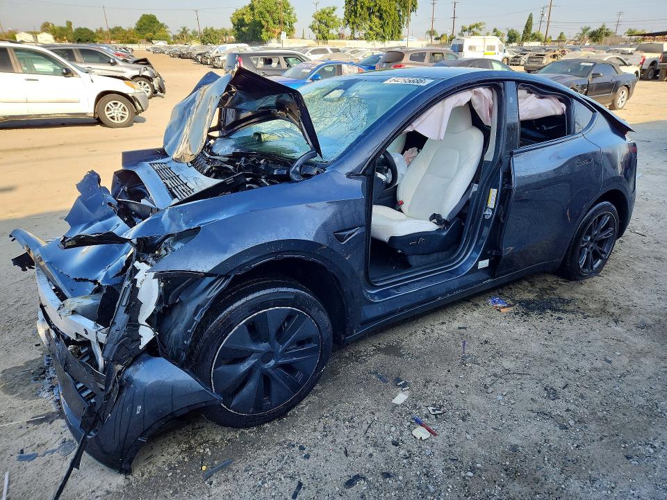 TESLA MODEL Y 2025 with VIN 7SAYGDED0SF315549 - Photo from auction