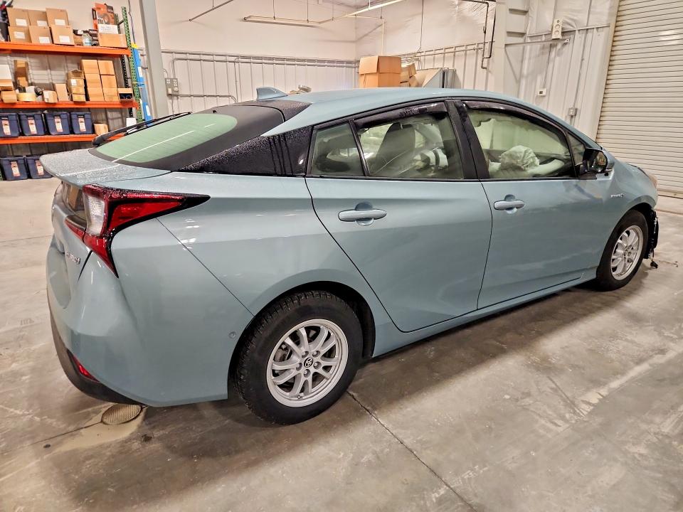 Photo 3 from auction – 2021 TOYOTA PRIUS with VIN JTDKAMFU5M3145238