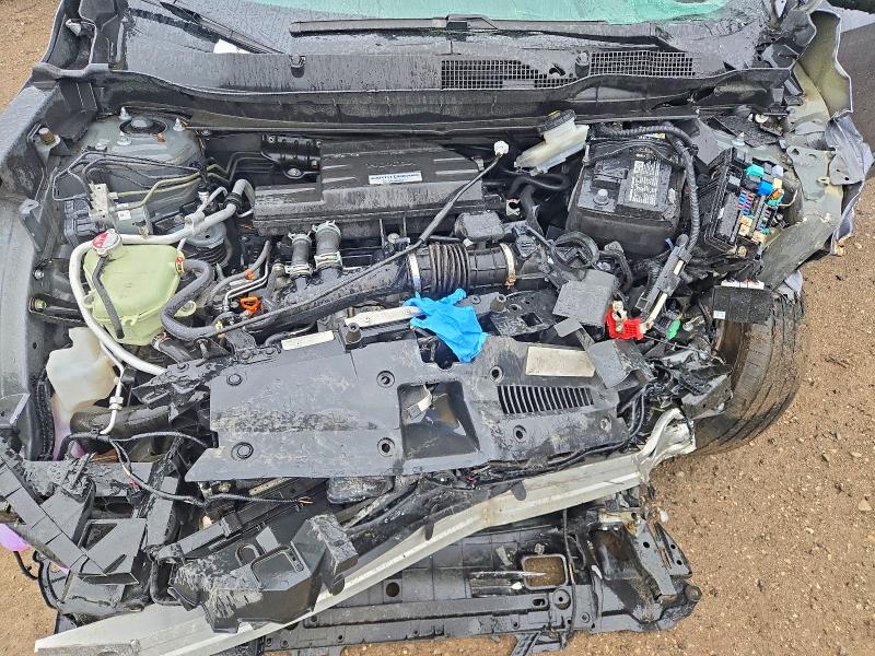 Photo 11 from auction – 2018 HONDA CR-V with VIN 2HKRW2H53JH146916