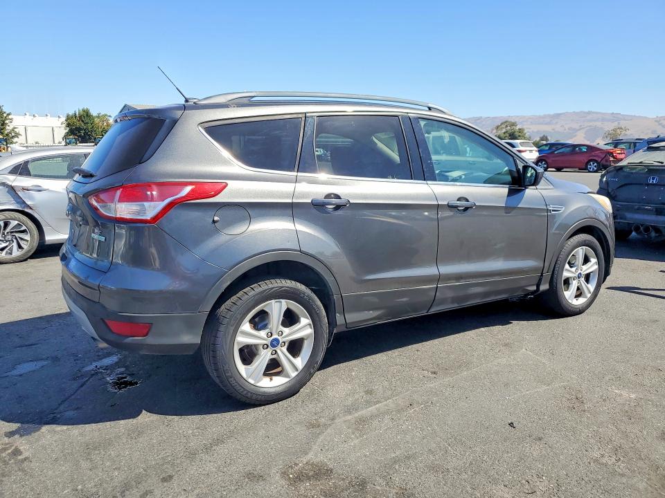 Photo 3 from auction – 2015 FORD ESCAPE with VIN 1FMCU0GX5FUC66079