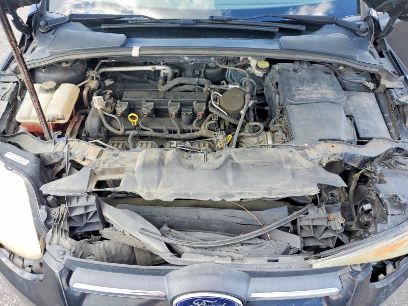 Photo 11 from auction – 2014 FORD FOCUS with VIN 1FADP3F2XEL435532