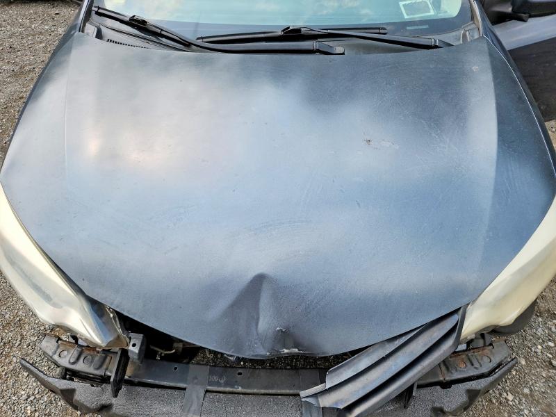 Photo 11 from auction – 2014 TOYOTA COROLLA with VIN 2T1BURHE9EC056999