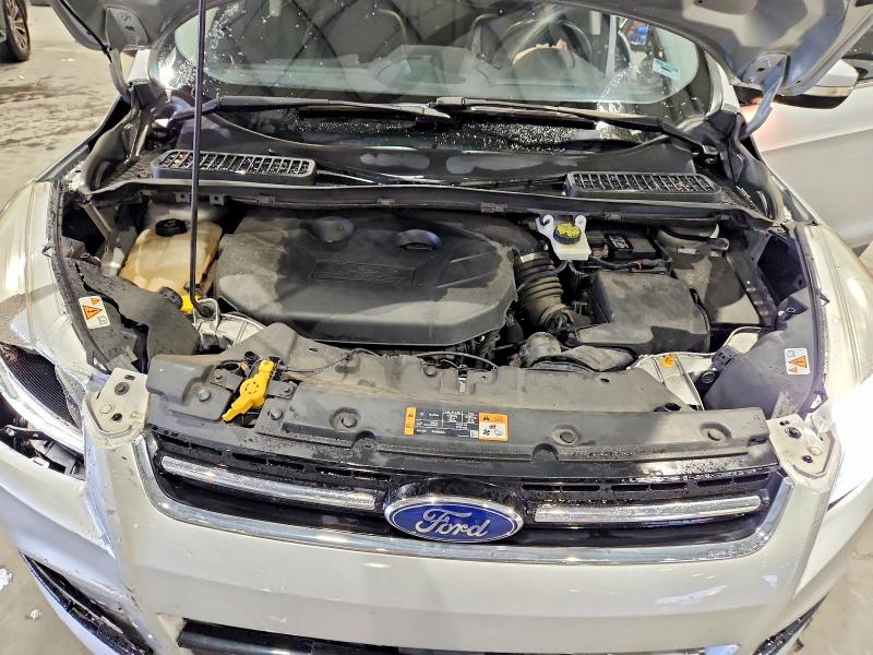 Photo 11 from auction – 2016 FORD ESCAPE with VIN 1FMCU0J94GUA74325