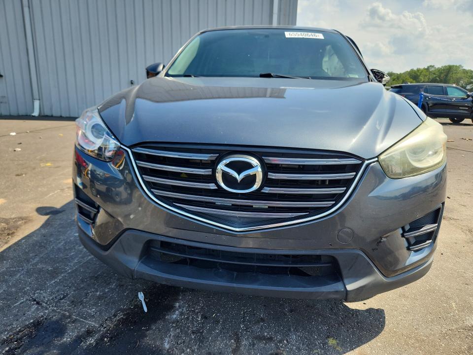 Photo 5 from auction – 2016 MAZDA CX-5 with VIN JM3KE2BYXG0812495