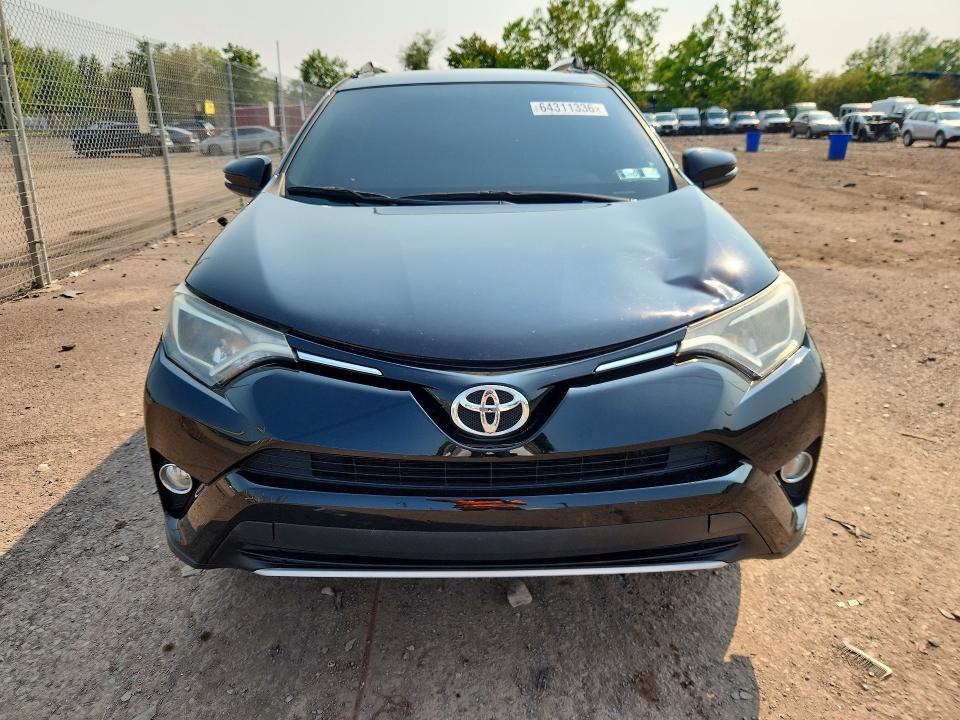 Photo 5 from auction – 2016 TOYOTA RAV4 with VIN 2T3RFREV4GW537068