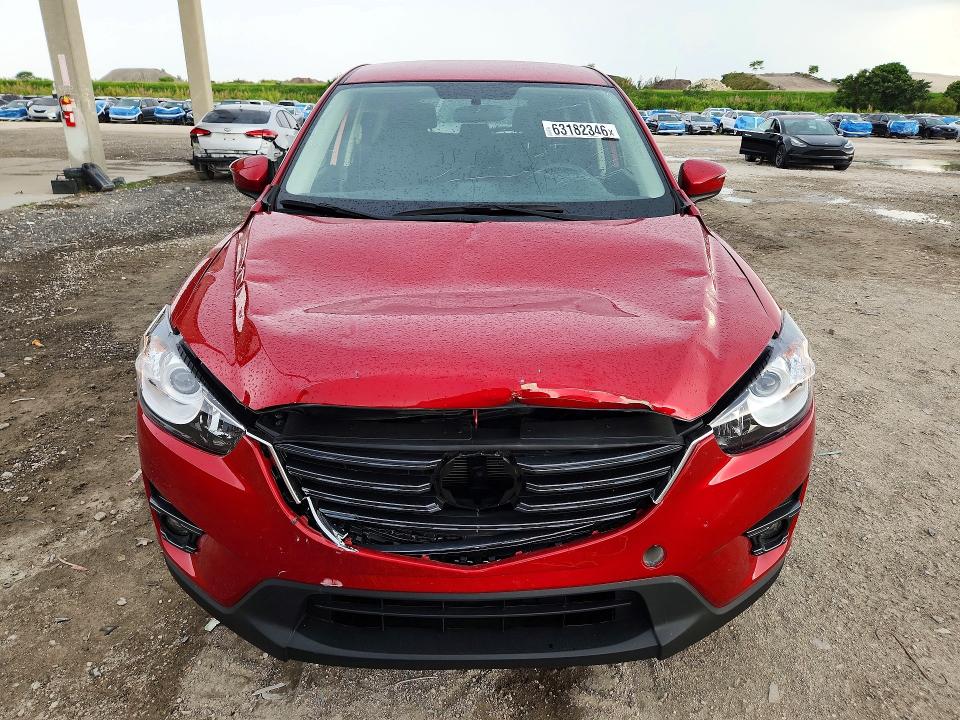 Photo 5 from auction – 2016 MAZDA CX-5 with VIN JM3KE2CY2G0875850