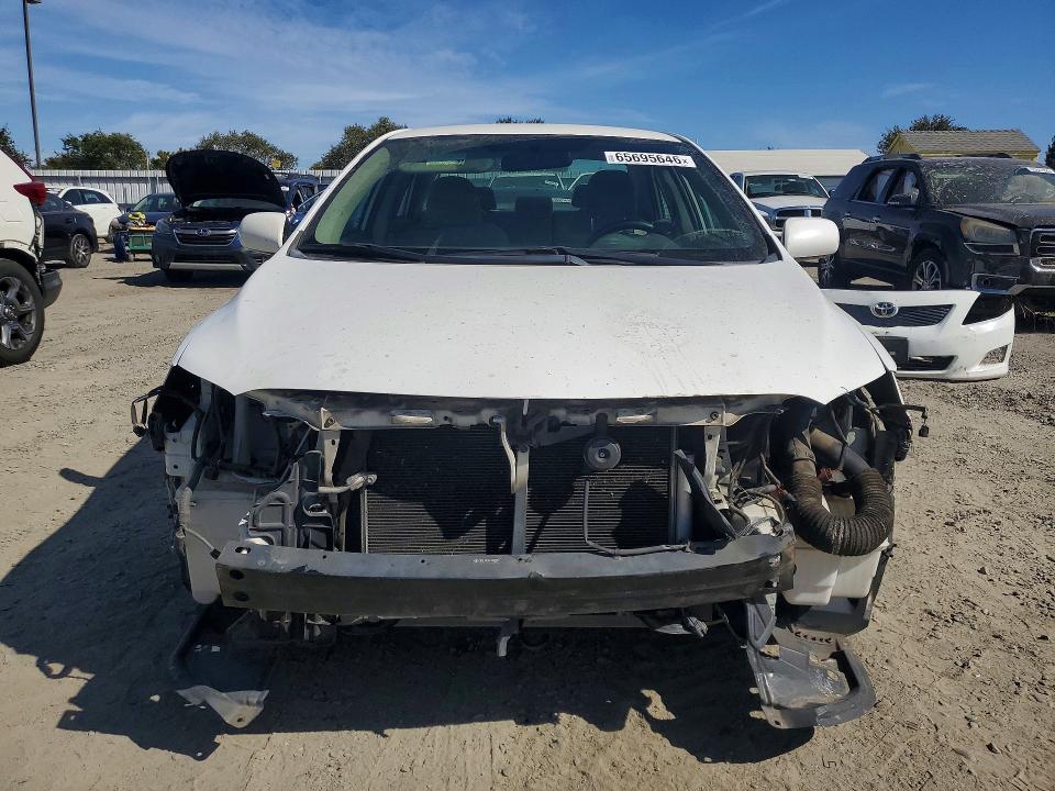 Photo 5 from auction – 2009 TOYOTA COROLLA with VIN JTDBL40E39J009009