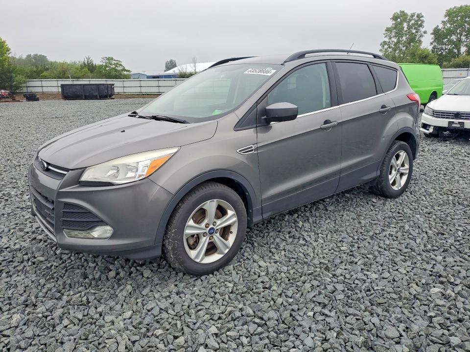 FORD ESCAPE 2014 with VIN 1FMCU9GX7EUB14713 - Photo from auction