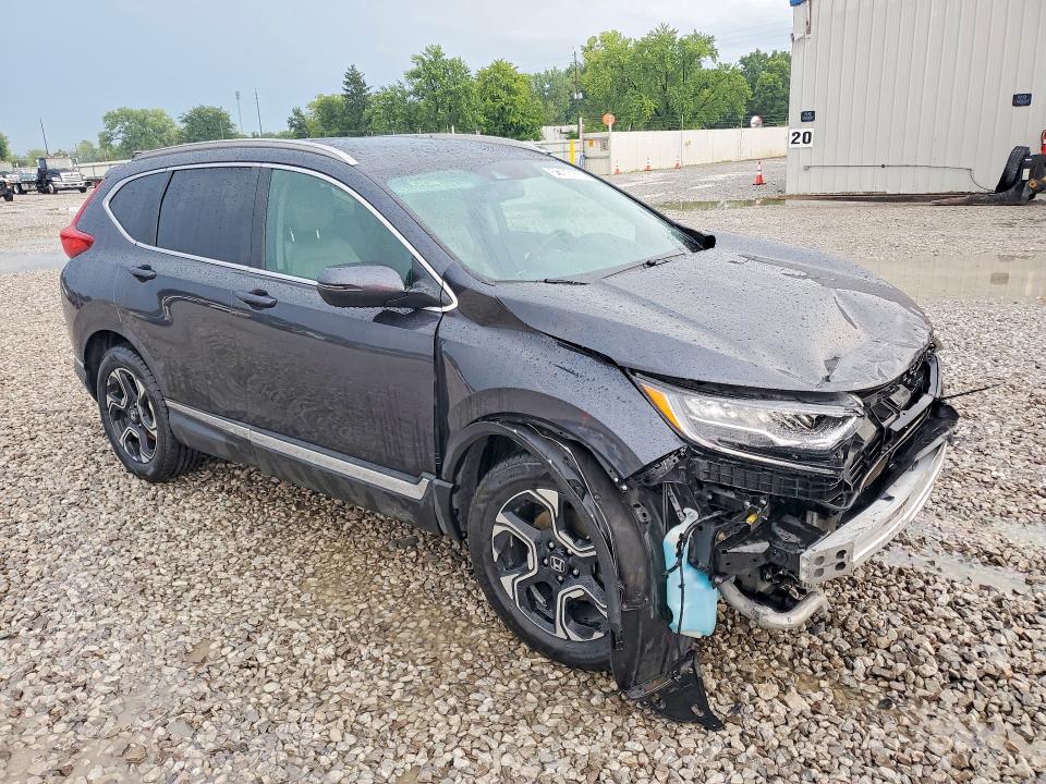 Photo 4 from auction – 2018 HONDA CR-V with VIN 7FARW2H93JE092474