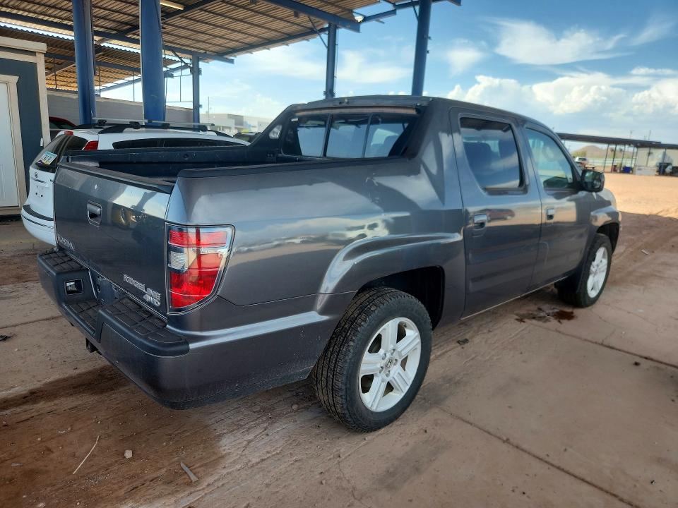 Photo 3 from auction – 2012 HONDA RIDGELINE with VIN 5FPYK1F53CB001579