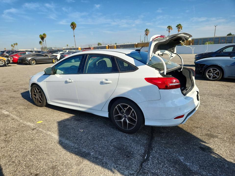 Photo 2 from auction – 2016 FORD FOCUS with VIN 1FADP3F26GL306299