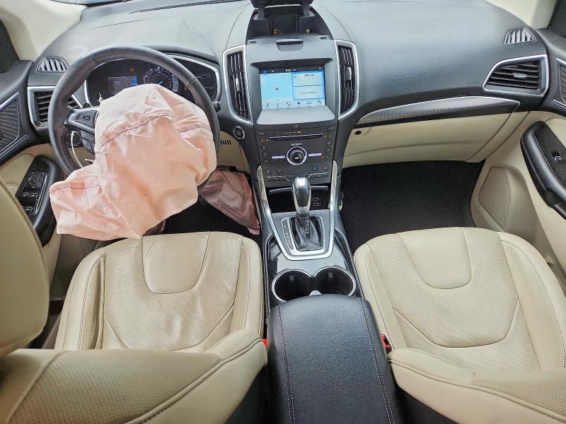 Photo 8 from auction – 2016 FORD EDGE with VIN 2FMPK4K85GBB09951