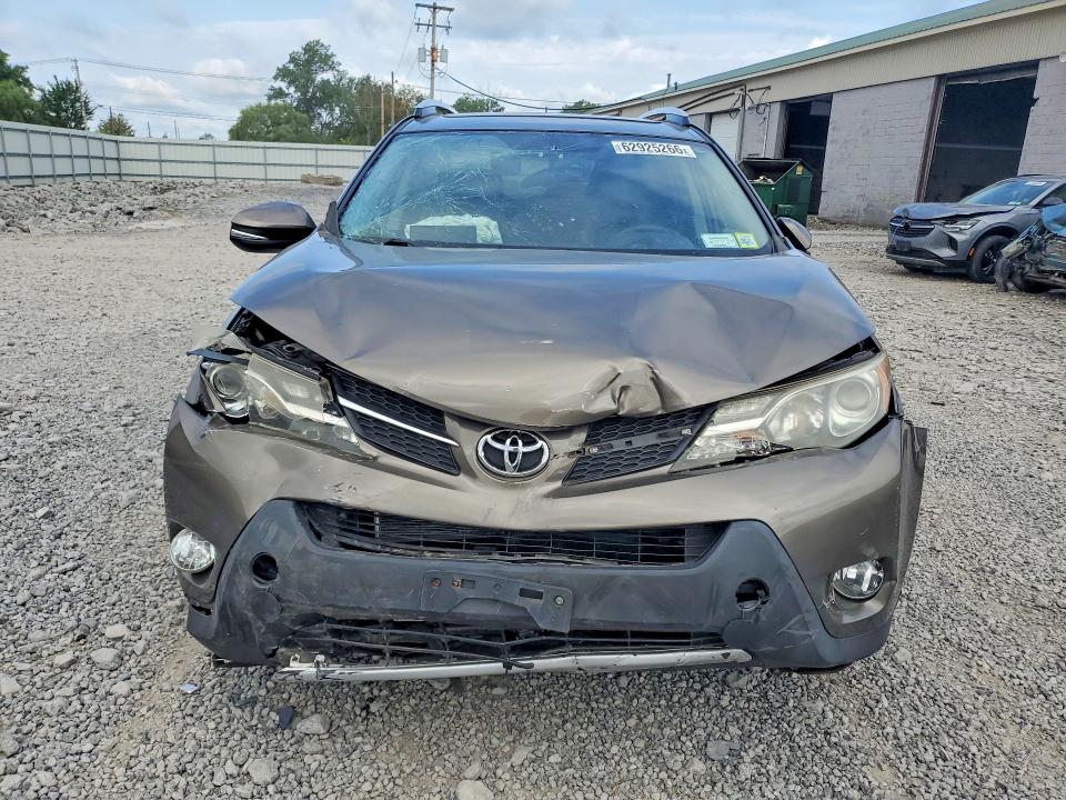 Photo 5 from auction – 2014 TOYOTA RAV4 with VIN JTMDFREV7ED083242