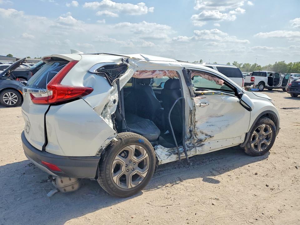 Photo 3 from auction – 2017 HONDA CR-V with VIN 2HKRW1H83HH514459