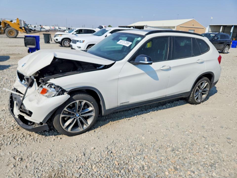 BMW X1 2014 with VIN WBAVM5C53EVV93164 - Photo from auction
