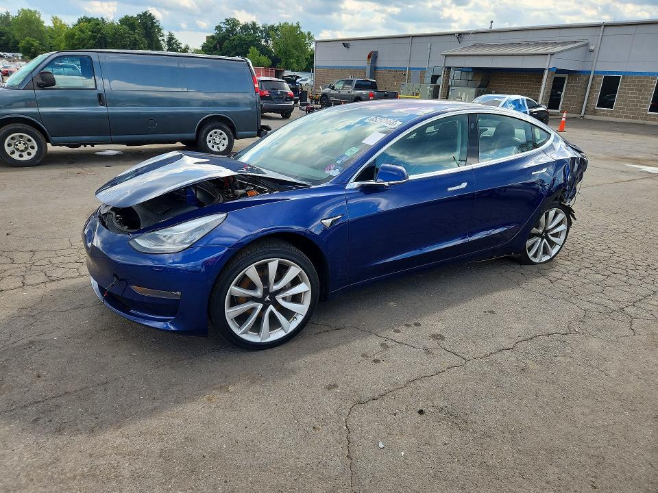 TESLA MODEL 3 2018 with VIN 5YJ3E1EA8JF032168 - Photo from auction