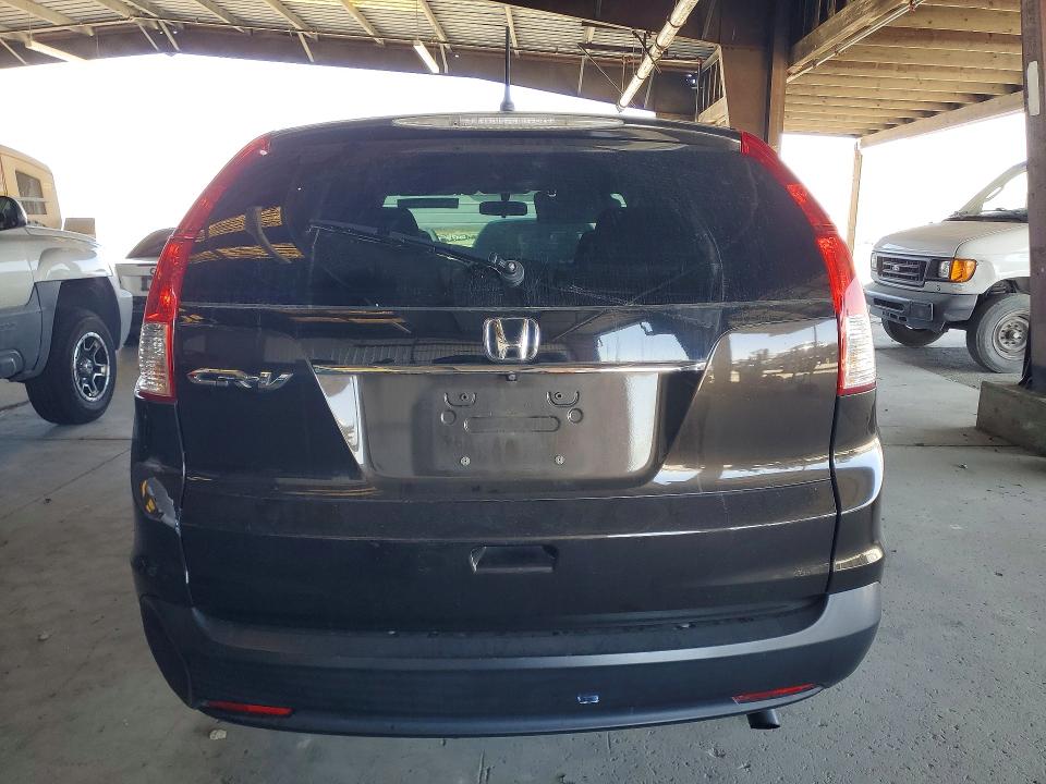 Photo 6 from auction – 2014 HONDA CR-V with VIN 2HKRM3H51EH565929