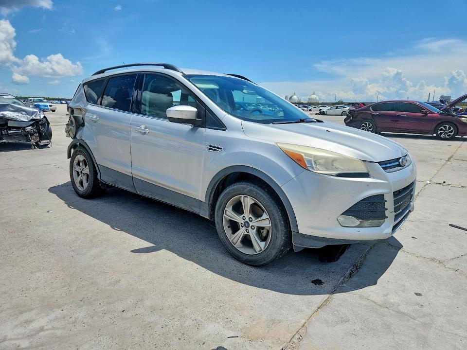 Photo 4 from auction – 2014 FORD ESCAPE with VIN 1FMCU0GX4EUC16353