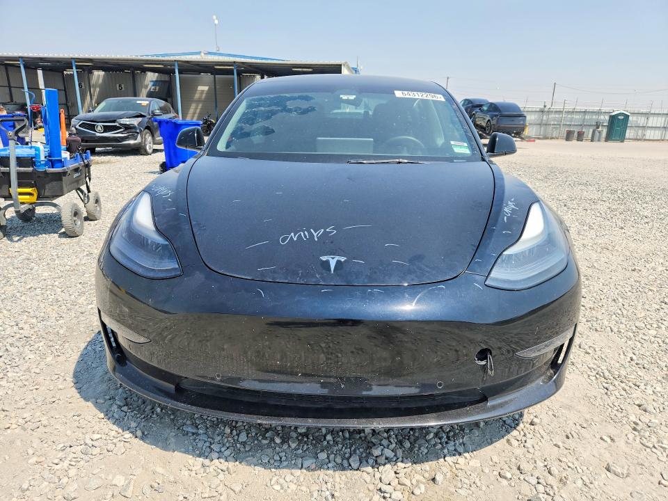 Photo 5 from auction – 2022 TESLA MODEL 3 with VIN 5YJ3E1EBXNF210094
